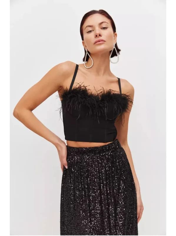 Corset top with feathers